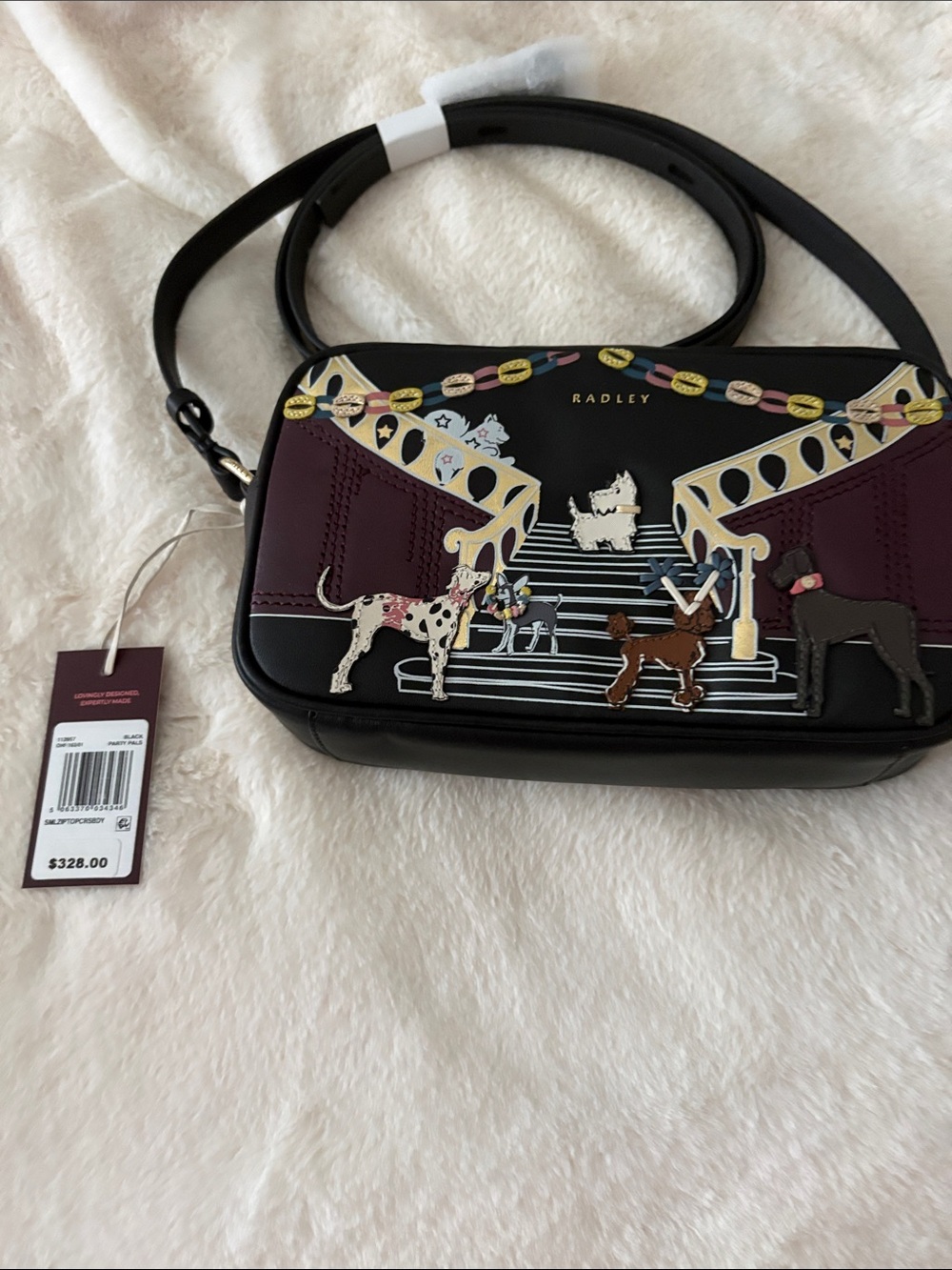 RADLEY LONDON Black Leather Crossbody with Playful Party Pals.